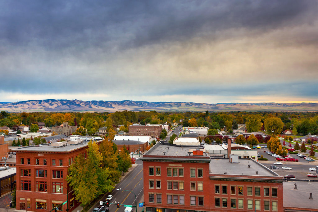 Overhead view of Downtown Walla Walla with mountains in distance