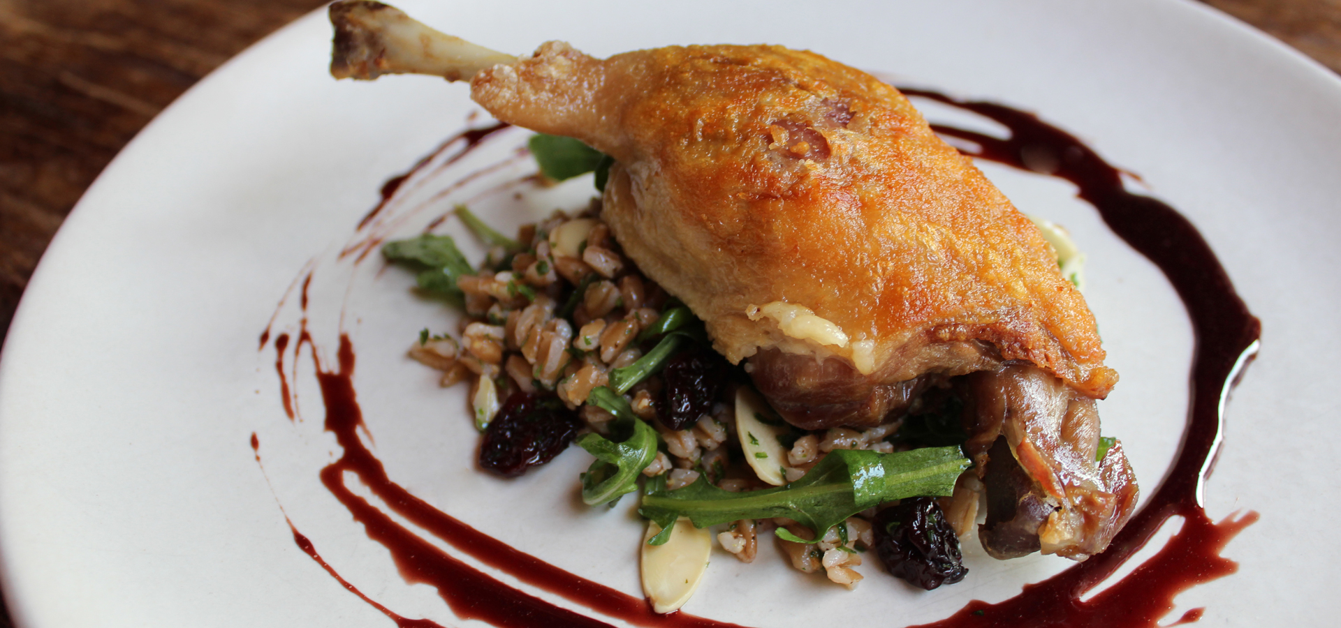 Duck Confit with Cherry Glaze and Farro Salad