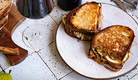Grown Up Grilled Cheese Sandwiches with Balsamic onions, Prosciutto, and Sliced Pears