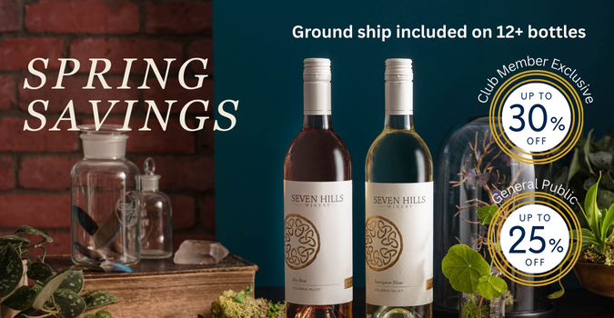 Two bottles of Seven Hills wine on a table with plants and a candle. Text reads Spring Savings and offers up to 30% off for club members and up to 25% off for the general public on 12+ bottles.